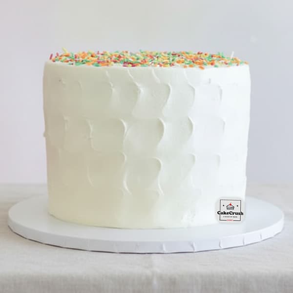 White Finish Cake with Rainbow Vermicelli Topping โ Dubai in dubai